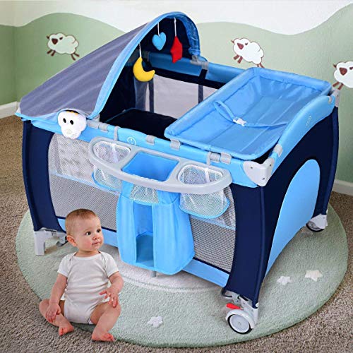 Costzon Nursery Center, 4 in 1 Pack and Play with Bassinet, Music, Detachable Mat, Awning, Mosquito Net, Storage Bag, Multifunction Baby Playard for Boys & Girls (Blue)